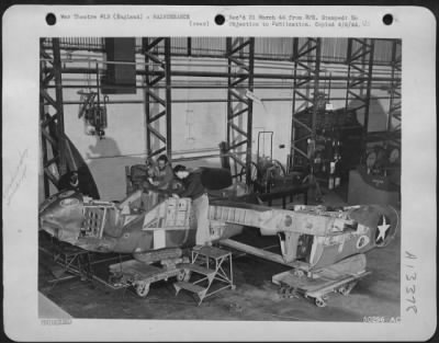 General > P-38 Mock up in a shop of the 8th AF Service Command . . . Where civilian technicians and soldiers learn the intricacies of a Lightning's innards.