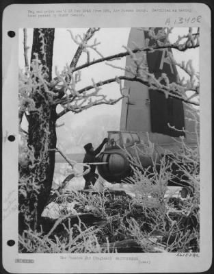 Thumbnail for General > Freezing ofgs and wet snows have crystallized to cover this U.S. 8th Air force base in England with a shroud of white. This has been the severest winter in England in almost a generation. Prior to take-off, this 91st Bombardment Group tail gunner