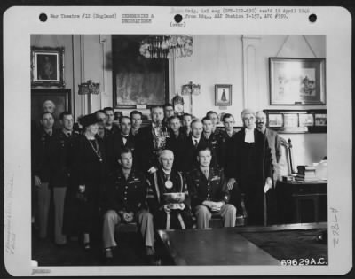 Thumbnail for Miscellaneous > As A Symbol Of Anglo-American Friendliness, Military Personnel Based At Station F-157 Presented A Cup To Representatives Of The City Of Colchester, Essex County, England During A Ceremony On 21 June 1945.