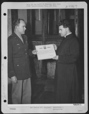 Thumbnail for Miscellaneous > Chaplain Of The 379Th Bomb Group Presents Certificate Of Appreciation To A Clergyman Of Bozeat, Northants, England During A Ceremony Held In England On 8 March 1945.