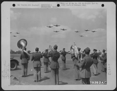 Thumbnail for Miscellaneous > As The 493Rd Bomb Group Band "The Flying Yanks" Plays, Republic P-47S Fly Overhead As A Tribute To Her Royal Highness, The Duchess Of Kent, During Her Visit To An Airbase At Dibden, England.  24 June 1943.