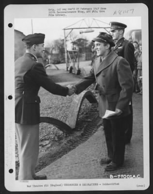 Thumbnail for Unidentified > A Member Of The 571St Bomb Squadron, 390Th Bomb Group Is Congratulated After Receiving An Award During A Ceremony At An Air Base Somewhere In England.  22 February 1944.