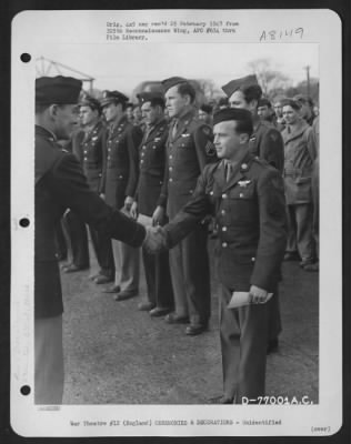 Thumbnail for Unidentified > A Member Of The 571St Bomb Squadron, 390Th Bomb Group Is Congratulated After Receiving An Award During A Ceremony At An Air Base Somewhere In England.  22 February 1944.