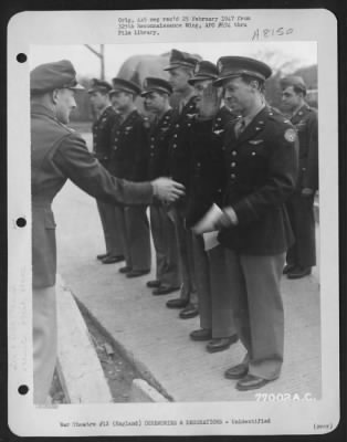 Thumbnail for Unidentified > A Member Of The 571St Bomb Squadron, 390Th Bomb Group Is Congratulated After Receiving An Award During A Ceremony At An Air Base Somewhere In England.  11 March 1944.