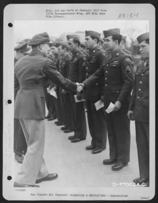 Thumbnail for Unidentified > A Member Of The 571St Bomb Squadron, 390Th Bomb Group Is Congratulated After Receiving An Award During A Ceremony At An Air Base Somewhere In England.  11 March 1944.