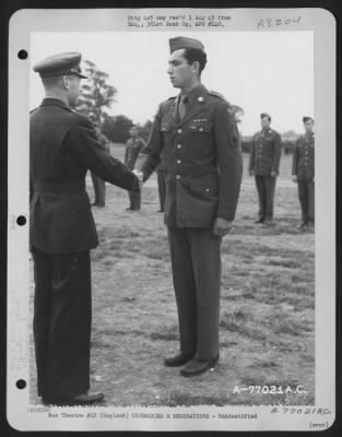 Thumbnail for Unidentified > Brig. Gen. Samuel E. Anderson Congratulates A Member Of The 391St Bomb Group On Receiving The Legion Of Merit During A Ceremony At An Air Base In England.  27 July 1944.