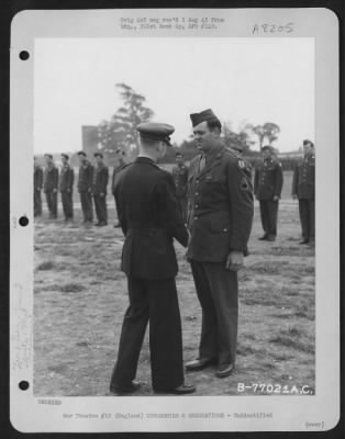 Thumbnail for Unidentified > Brig. Gen. Samuel E. Anderson Congratulates A Member Of The 391St Bomb Group On Receiving The Legion Of Merit During A Ceremony At An Air Base In England.  27 July 1944.