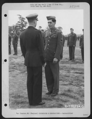 Thumbnail for Unidentified > Brig. Gen. Samuel E. Anderson Congratulates A Member Of The 391St Bomb Group On Receiving The Legion Of Merit During A Ceremony At An Air Base In England.  27 July 1944.