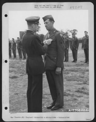 Thumbnail for Unidentified > Brig. Gen. Samuel E. Anderson Congratulates A Member Of The 391St Bomb Group On Receiving The Legion Of Merit During A Ceremony At An Air Base In England.  27 July 1944.