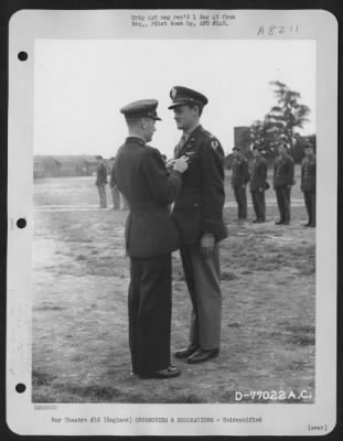 Thumbnail for Unidentified > Brig. Gen. Samuel E. Anderson Congratulates A Member Of The 391St Bomb Group On Receiving The Legion Of Merit During A Ceremony At An Air Base In England.  27 July 1944.