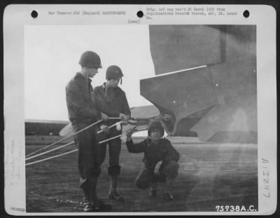 General > Members Of The 439Th Troop Carrier Group Make A Final Check On The Glider Tow Ropes Before Taking Off From An Air Base Somewhere In England.  8 September 1944.