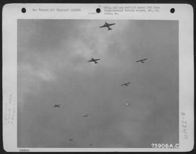 Thumbnail for General > A Pattern Of Transport Planes And Gliders Is Pictured Against A Grey English Sky As The 439Th Troop Carrier Group Sends Load After Load Of Airborne Infantrymen To France Where Allied Forces Are Fighting For The Liberation Of Europe.  7 June 1944.