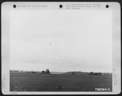 General > A Pattern Of Transport Planes And Gliders Is Pictured Against A Grey English Sky As The 439Th Troop Carrier Group Sends Load After Load Of Airborne Infantrymen To France Where Allied Forces Are Fighting For The Liberation Of Europe.  7 June 1944.