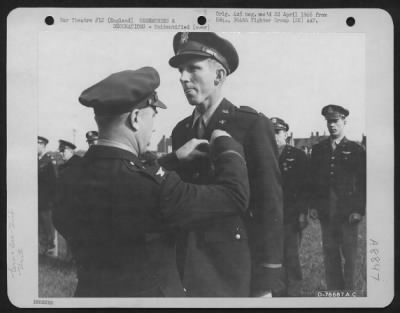 Thumbnail for Unidentified > An Officer Presents An Award To A Member Of The 314Th Service Group Of The 364Th Fighter Group During A Ceremony At An Airbase Somewhere In England.  28 April 1944.