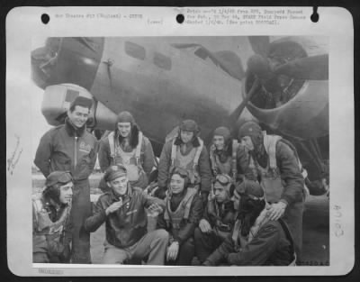 Consolidated > ENGLAND-At the bomber base to which he was invited by the Boeing B-17 Flying ofrtress crew commanded by 2nd Lt. Seymour W. Isaacs, 20, 2827 West 28th St., Brooklyn, N.Y., in gratitude for his escorting them home from their first bombing attack