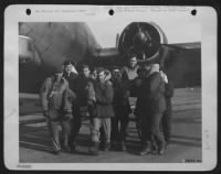 Thumbnail for Members of Major James A. Smyrl's Boeing B-17 Flying ofrtress crew carry him and S/Sgt. Alfred L. Carll away from the ship, after they returned from the mission to Berlin, Feb. 3, 1945, when the German capital was bombed by 1,000 ofrtresses - Page 1