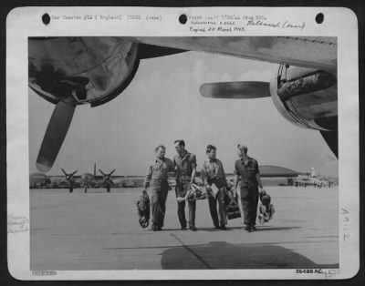 Thumbnail for Consolidated > These men put through their paces the Flying ofrtresses that pass through an Eighth Air force base depot in England for modification before entering into combat. Left to right: Lt. John E. Austin, Seattle, Wash., pilot; Cpl. J.P. Holt, Nashville