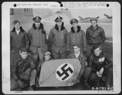 General > Lt. Carr And Crew Of The 452Nd Bomb Gp Holding A Nazi Flag At An Airbase In England.  14 January 1945.