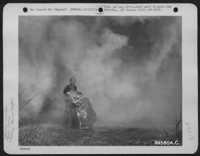 Thumbnail for Consolidated > Simulated Gas Attacks Are Part Of The Chemical Warfare Training Program Of The 353Rd Fighter Group At An 8Th Air Force Base In England - The Contaminated Protective Cover Will Be Discarded When The Attack Is Over.  March 1944.