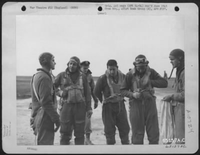 Thumbnail for General > Colonel Harold W. Bowman, Commanding Officer Of The 401St Bomb Group, Discusses Mission Over Emden, Germany, On 11 December 1943, With The Crew Of His Boeing B-17 "Flying Fortress" After Return To Their Base In England.