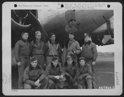 General > Lt. May And Crew Of The 613Th Bomb Squadron, 401St Bomb Group, Beside A Boeing B-17 "Flying Fortress" 'Snicklefritz' At An 8Th Air Force Base In England.  12 March 1945.