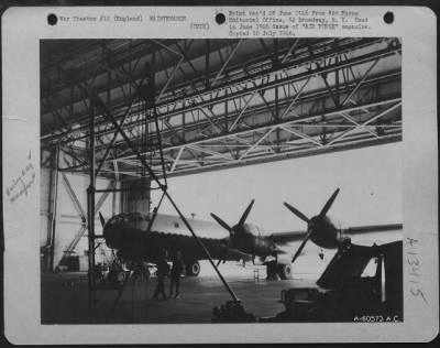 General > Wings Over Germany Today Belong To The Allies, And A Large Number Of Them Bear The Label 'Made In The Usa'.  A Boeing B-29 Is Serviced In A Raf Hangar At Borham Airbase In England.