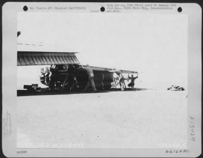 Thumbnail for General > Members Of The 381St Bomb Group, Use A Pneumatic Pillow To Hoist Wing Section Into Position Of A Boeing B-17 Flying Fortress.  England, 1 August 1943.