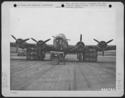 Thumbnail for General > Large Rubber Lift Bags Are Used To Aid In Jacking Up A Boeing B-17 "Flying Fortress" Whose Landing Gear Has Collapsed.  The Lift Bags Are Rolled Beneath The Wing And Inflated Until The Necessary Pressure Is Exerted To Raise The Wing.  Rubber Was Chose As