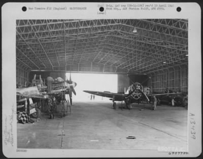 Thumbnail for General > Inside A 353Rd Fighter Group Hangar At A Base In England, North American P-51'S And Republic P-47S Are Carefully Checked And Repaired By Maintenance Crews.  26 June 1945.