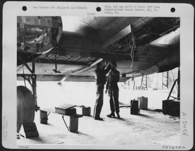 Thumbnail for General > Mechanics Of The 439Th Troop Carrier Group Repair A Douglas C-47 At Their Base Somewhere In England.  7 May 1944.