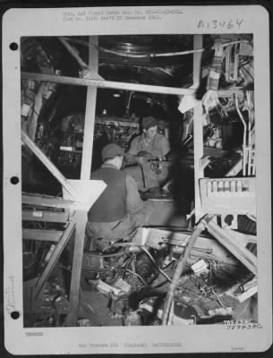 Thumbnail for General > Cpl. Frank P. Krofinger Of New York City And Cpl. William L.E. Smith Of Denver, Colorado Do Repair Work Inside A Damaged Consolidated B-24 At An Airbase At Warton, England.  23 March 1943.