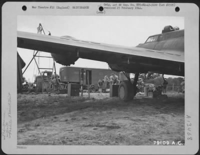 Thumbnail for General > Members Of A Mobile Repair Unit Of An 8Th Air Force Service Command Repair The Boeing B-17 "Flying Fortress" "Stella" Which Crash Landed In A Field In Nr. Bournemouth, Hants, England.  This Repair Unit Was Rushed To The Scene Of The Landing Where Repairs