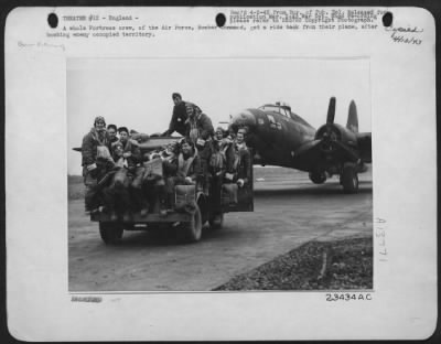 General > A whole ofrtress crew, of the Air force, Bomber command, get a ride back from their plane, after bombing enemy occupied territory.