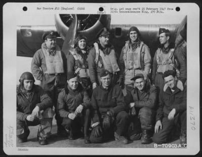 General > Colonel Lyle And Crew Of The 379Th Bomb Group Pose Beside A Boeing B-17 "Flying Fortress" At An 8Th Air Force Base In England On 12 March 1945.