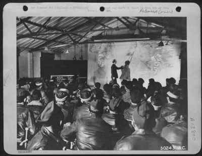 General > Capt. Carlile Cruthcher, intelligence Officer, is preparing the crews for flak and fighter opposition they might encounter. The Capt. Is from Louisville, Ky., where he worked on the Courier Journal and Louisville Times.