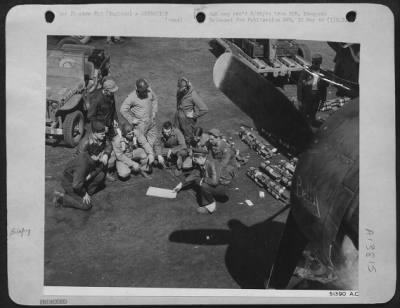 Thumbnail for General > MISSION AHEAD: Pilot and crew members of this Boeing B-17 Flying ofrtress hold a last minute special briefing in front of their ship, moments before taking off on their mission. for the first time, Nazi targets were hit by two large forces of