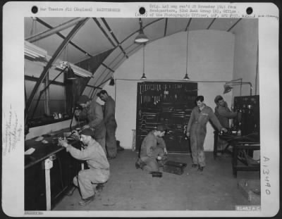 Miscellaneous > Maintenance Men Of The 92Nd Bomb Group At Work In An Aircraft Supply Warehouse.  England, 29 November 1943.