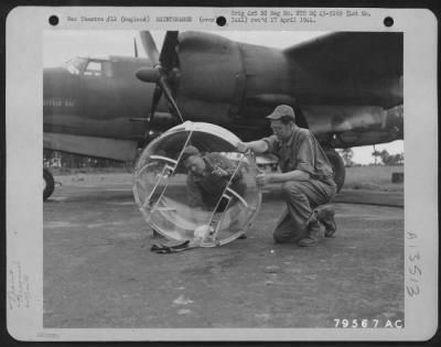 Thumbnail for Painting & Washing > Ssgt Carl Palm Of Easton, Massachusetts, And Pvt. Karl Sutherland Of Portland, Maine, Members Of The 323Rd Bomb Group, Wash Down The Plexi-Glass Nose Of A Martin B-26 At Their Base At Colne, England.  20 July 1943.