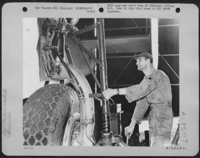 Thumbnail for Tires & Wheels > When Scores Of B-24S Began Arriving At An Asc Depot In England, All Requiaring The Removal Of Their Landing Gear Struts For A Bearing Race Modification, Mechanics Were Compelled To Clamber On Wooden Platforms, Propped Under The Wings, In Order To Remove T