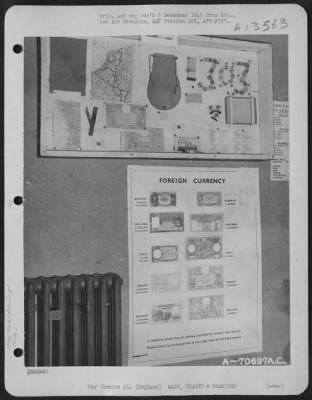 General > Charts Showing Escape Aids And Foreign Currency Adorn The Wall Of The Briefing Room At Hdq., 1St Bomb Division, Based In England.