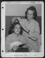 Thumbnail for Gertrude G. Dawson Of Vadergrift, Penn. And Agnes A. Jensen Of Stanwood, Mich. Getting Ready For The Photo As They Arrived On Friendly Shores... Both Members Of An Evac Unit Missing For Two Months After Their Plane Was Forced Down In Albania Enroute To Ba - Page 1