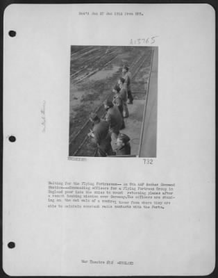 Thumbnail for General > Waiting For The Flying Fortresses - An 8Th Aaf Bomber Command Station -- Commanding Officers For A "Flying Fortress" Group In England Peer Into The Skies To Count Returning Planes After A Recent Bombing Mission Over Germany.  The Officers Are Standing On