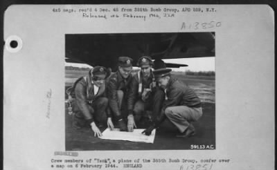 Thumbnail for General > Crew Members Of "Yank" A Plane Of The 385Th Bomb Group, Confer Over A Map On 6 February 1944.  England.