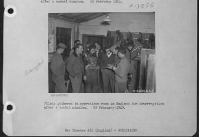 Thumbnail for General > Pilots Gathered In Operations Room In England For Interrogation After A Combat Mission.  22 February 1945.