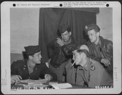 Thumbnail for General > Capt. Bonneau Interrogates Lt. Cahill, Sgt. Mccrory And An Unidenfied Member, 381St Bomb Group, After Mission Over Lyons, France.  1 May 1944, England.