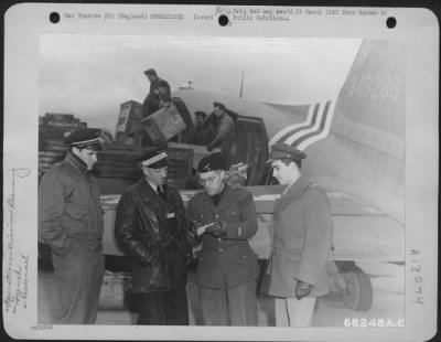 Thumbnail for General > Douglas C-47S Transferred To The French Air Corps And Manned By French Crews Are Hustling Critical Supplies Right Up To Advanced Airfields From The Huge Air Technical Service Command Depots In Britain.  While The French And American Crews Finish Loading A