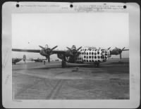 Thumbnail for The gaily painted leadship "First Sergeant", is used at a Liberator base, somewhere in England to organize formations as the Consolidated B-24 Liberators take off on their missions over enemy territory. There are bulb sockets in the side of the plane - Page 1