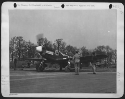 Thumbnail for North American > Capt. Gentile (in cockpit) warming up motor seconds before actual take-off on April 8th, 1944 Ground crew members wave him off. On his return, Gentile jumped his score from 27 to 30.