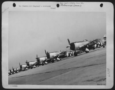 Republic > Lined up at a base depot in England are these Republic P-47 Thunderbolts of the 8th Air force. Modified on their arrival from America, the aircraft are prepared for action in the skies of Europe. They bear the special striped markings of the Allied