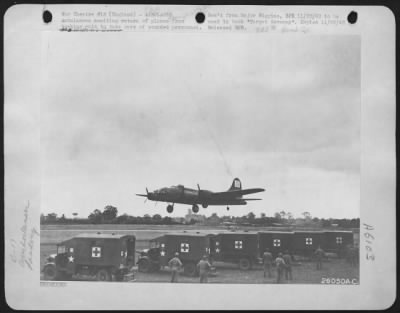 Boeing > Ambulances awaiting return of planes from bombing raid to take care of wounded personnel.